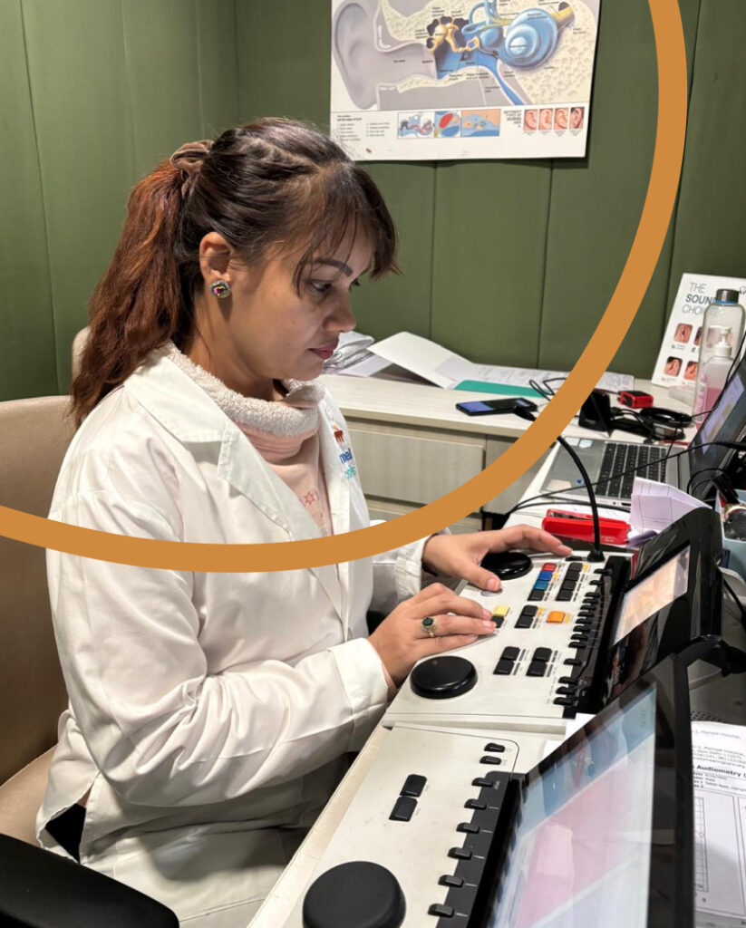 Audiologist performing a hearing test